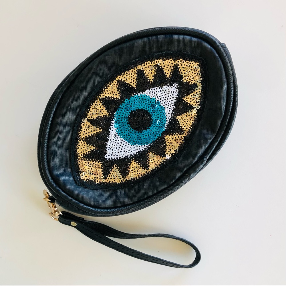 Eye sequin clutch
